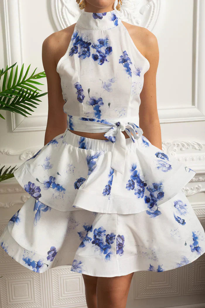 Conjunto – Top Estampado Sem Mangas + Saia Curta Plissada de Cintura Alta